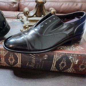 Florsheim black leather cap toe oxfords